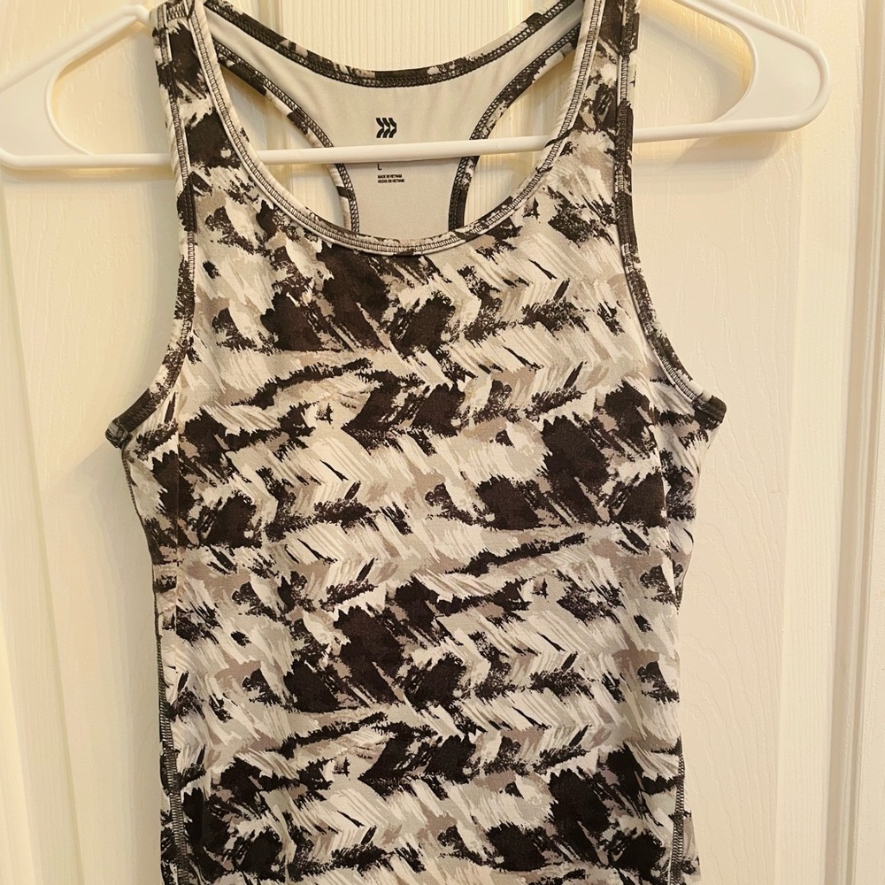 Selling all in one motion size large workout top